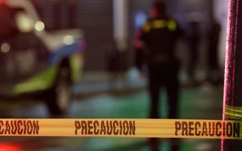 Línea de precaución en una escena de policía / Agencia Enfoque