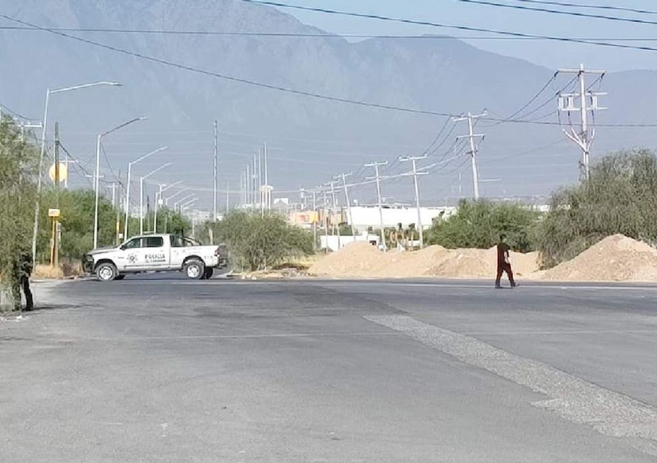 Los cuerpos de dos hombres fueron encontrados sobre una jardinera en la vía pública. | Agustín Martínez