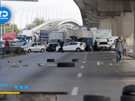 Bloqueo en la autopista México-Puebla a la altura de la Central de Abastos en la capital poblana | Cuartoscuro | Archivo