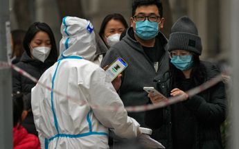 Reducen restricciones covid en China / AFP