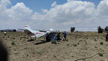 La avioneta quedó en terrenos de cultivo a un costado del Parque Industrial San Miguel Quetzalcóatl / Especial