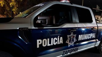 Patrulla de la Policía de Zapopan en el lugar donde fue hallado el cuerpo del hombre | Javier León