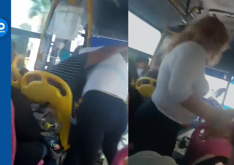 Mujeres peleando en camión | Especial