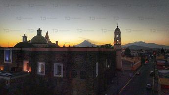 Aspecto de un atardecer en San Pedro Cholula, desde las alturas / Andrés Lobato