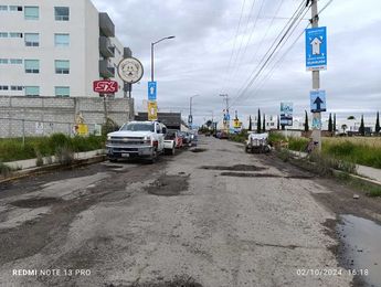 Baches en Coronango, Puebla fueron tapados con recurso de vecinos tras la omisión de la autoridad municipal / Cortesía