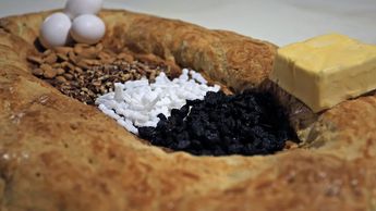 La Rosca de Reyes tradicional de San Pedro Cholula lleva pasas, mantequilla, nueces y almendras | Andrés Lobato
