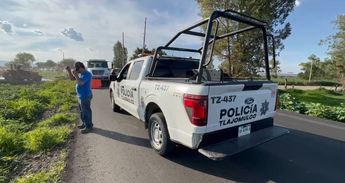 Patrulla de la Policía de Tlajomulco en el lugar donde el auto tuvo el accidente | Usi Toledo