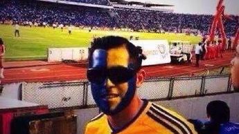 Israel Jiménez pintado del rostro con colores de Tigres en un Clásico Regio / Cortesía