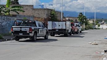 Vecinos de la colonia alertaron a las autoridades tras hallar a un hombre sin vida sobre un camino de terracería | Imagen: Juan Carlos Munguía