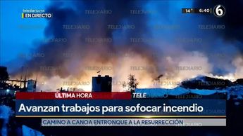 Incendio en recicladora consume un auto en La Resurrección, Puebla