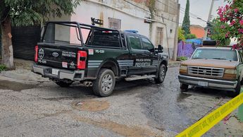 Patrulla de la Policía Estatal en el lugar donde se registró el ataque a balazos | Juan Carlos Munguía