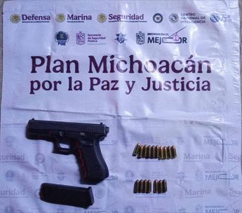 El detenido llevaba un arma de fuego y munición. | César Cabrera