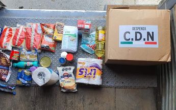 Despensa y caja con leyenda de grupo delictivo. | Cortesía
